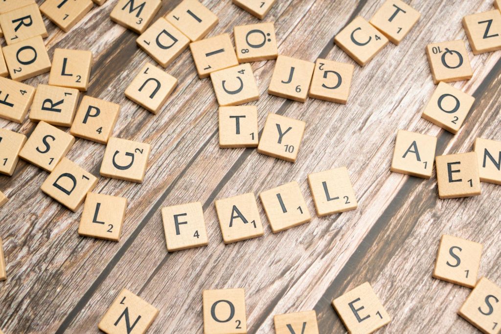 scrabble letters spelling out the word fail